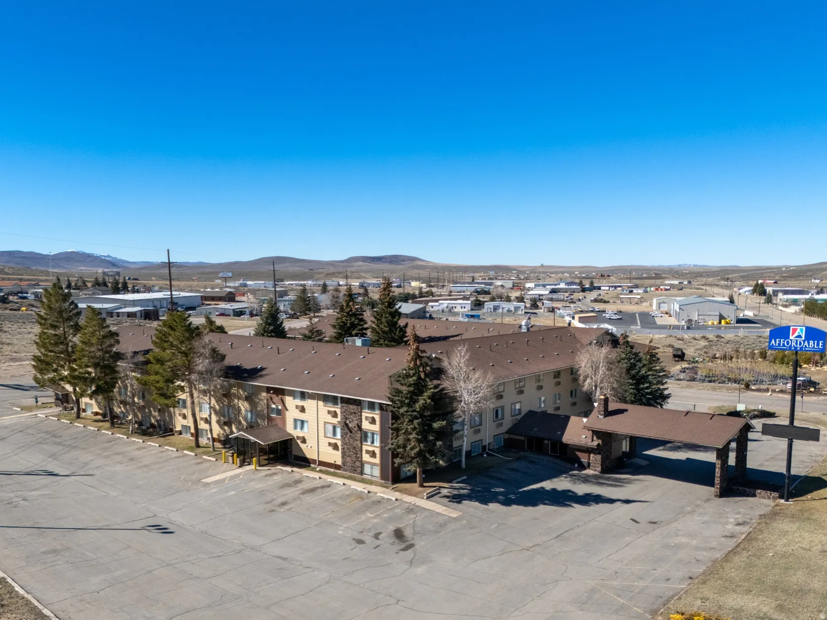 Drone / aerial view of a mountain backdrop