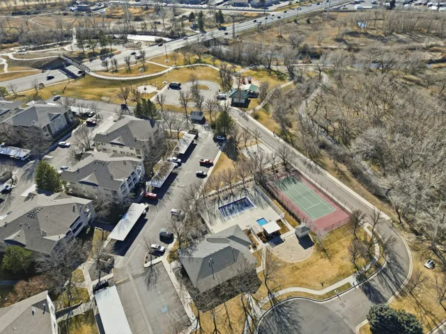 Aerial view of property's location featuring nearby suburban area