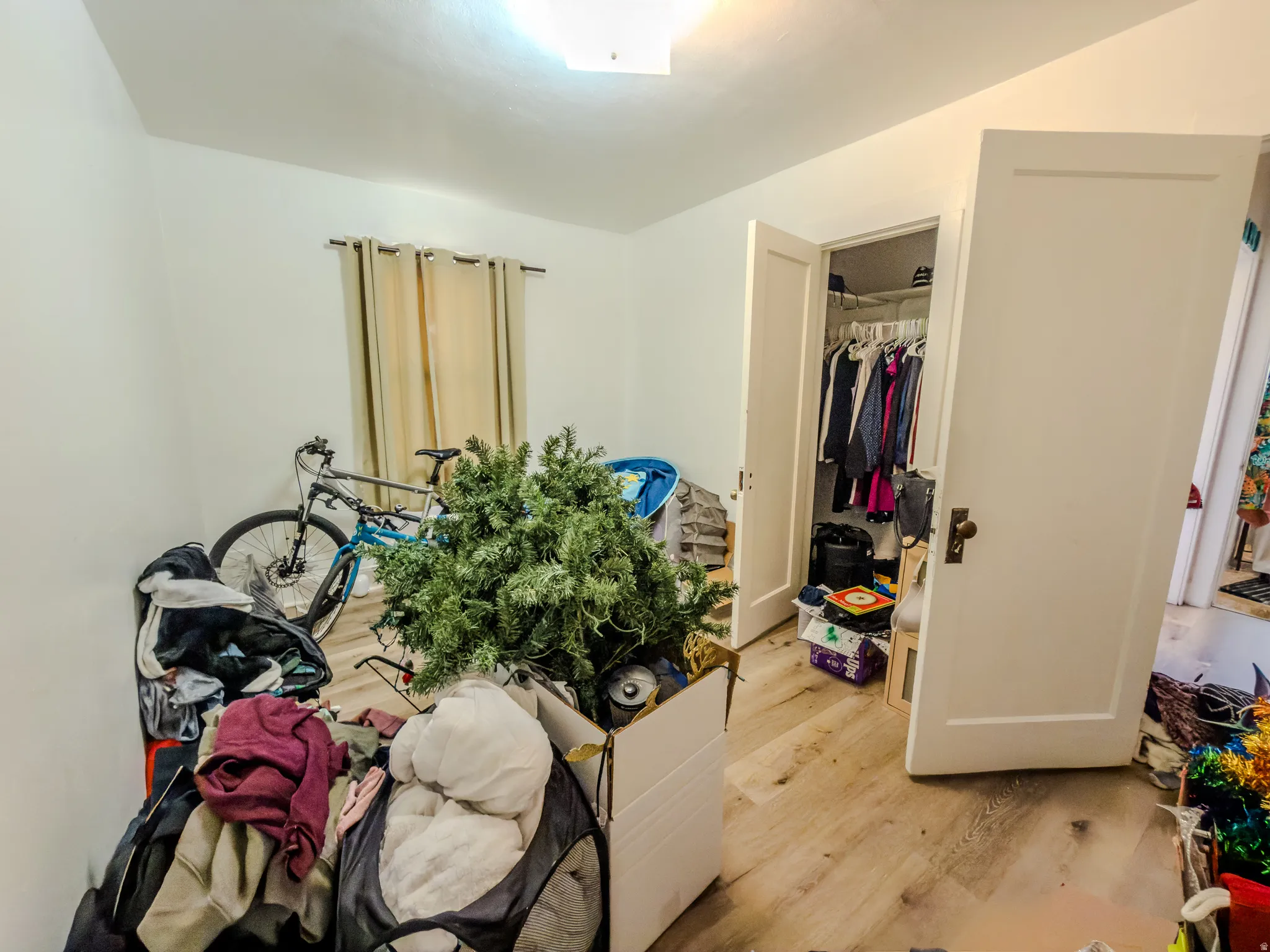 Bedroom with light wood-style flooring