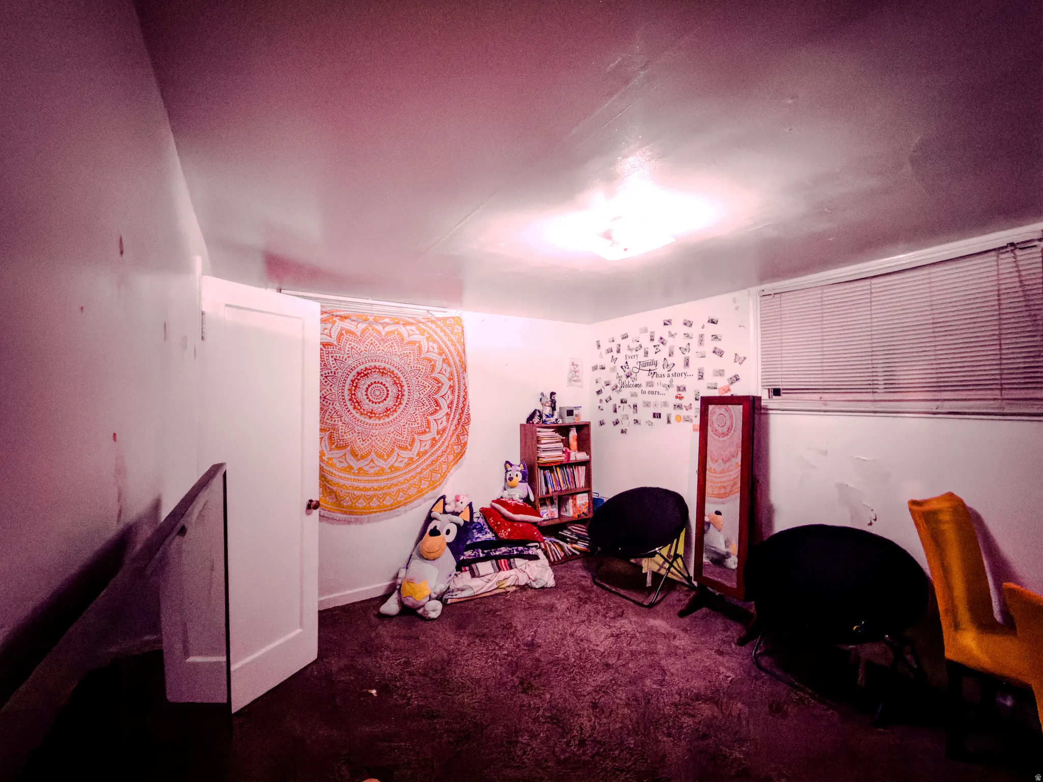 Playroom featuring dark carpet