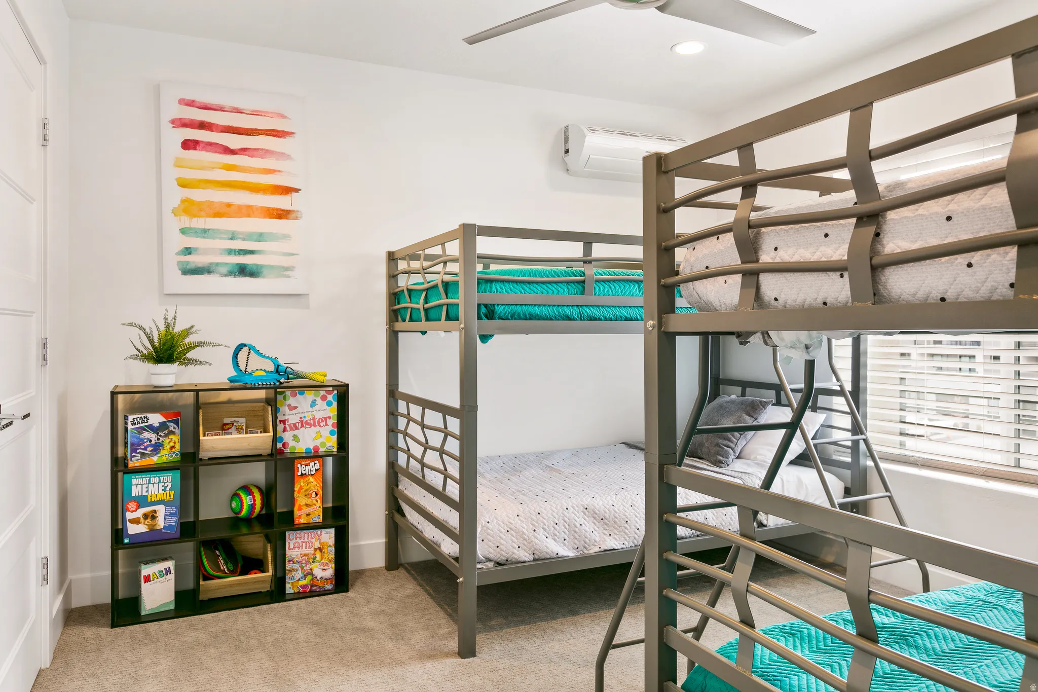 Bedroom with light colored carpet, a ceiling fan, and recessed lighting
