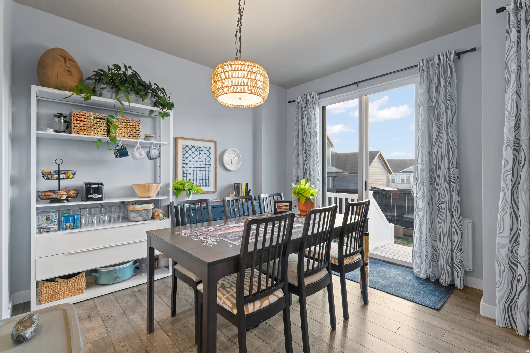 Dining space featuring wood-type flooring