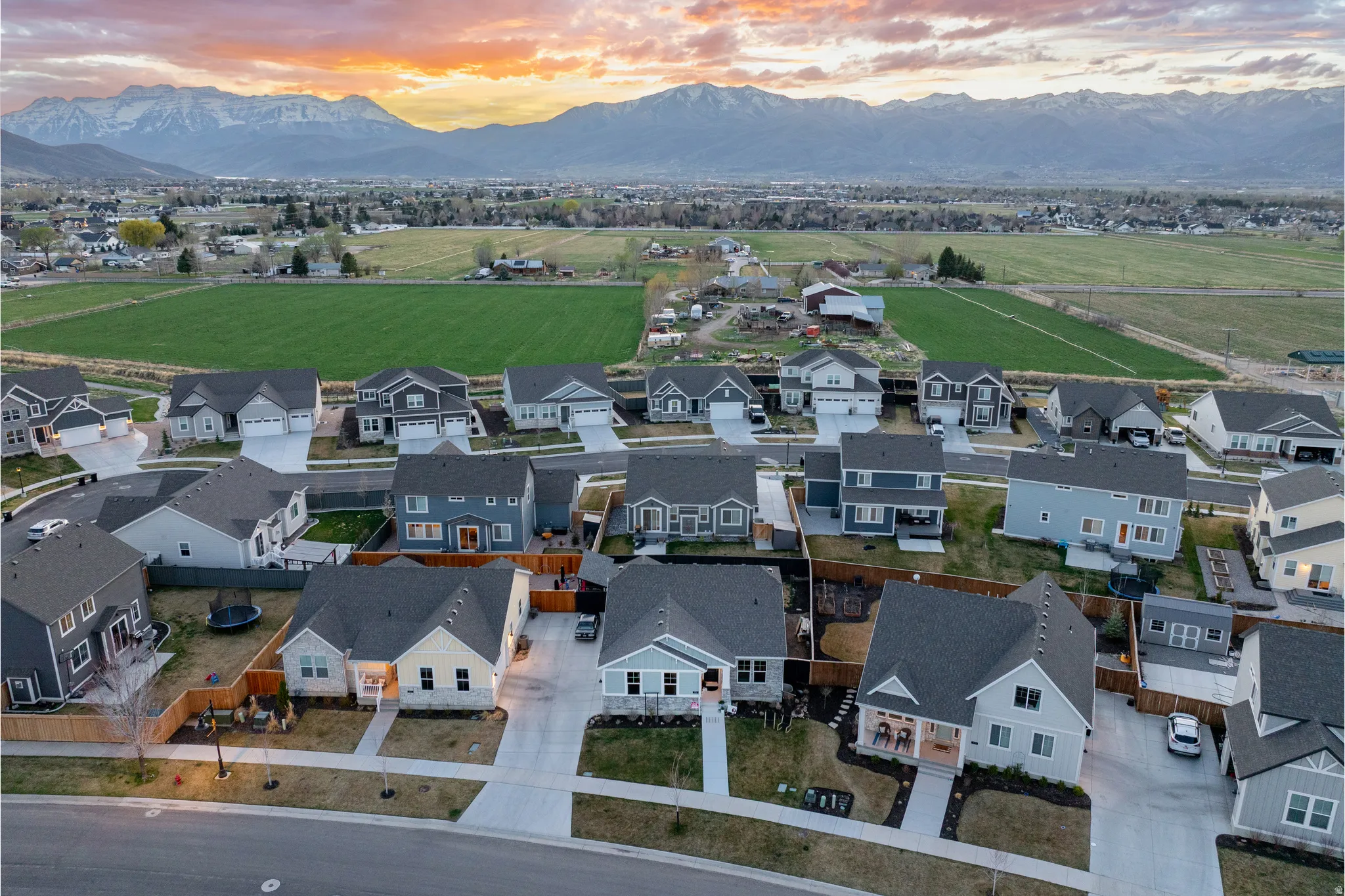 Aerial view of residential area featuring mountains
