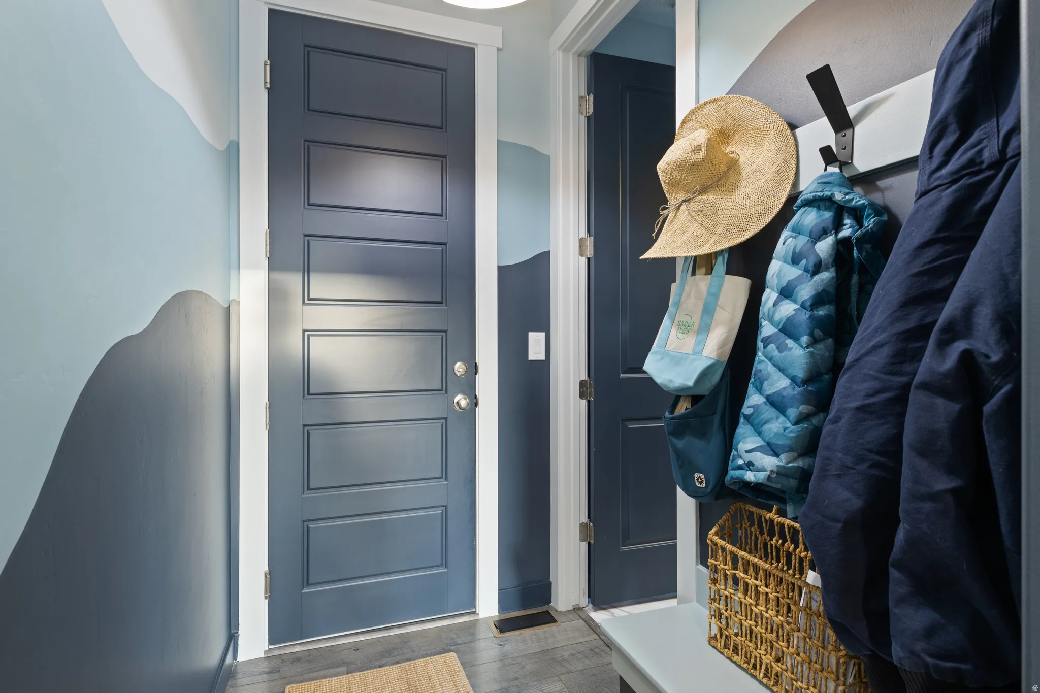 Doorway with wood finished floors