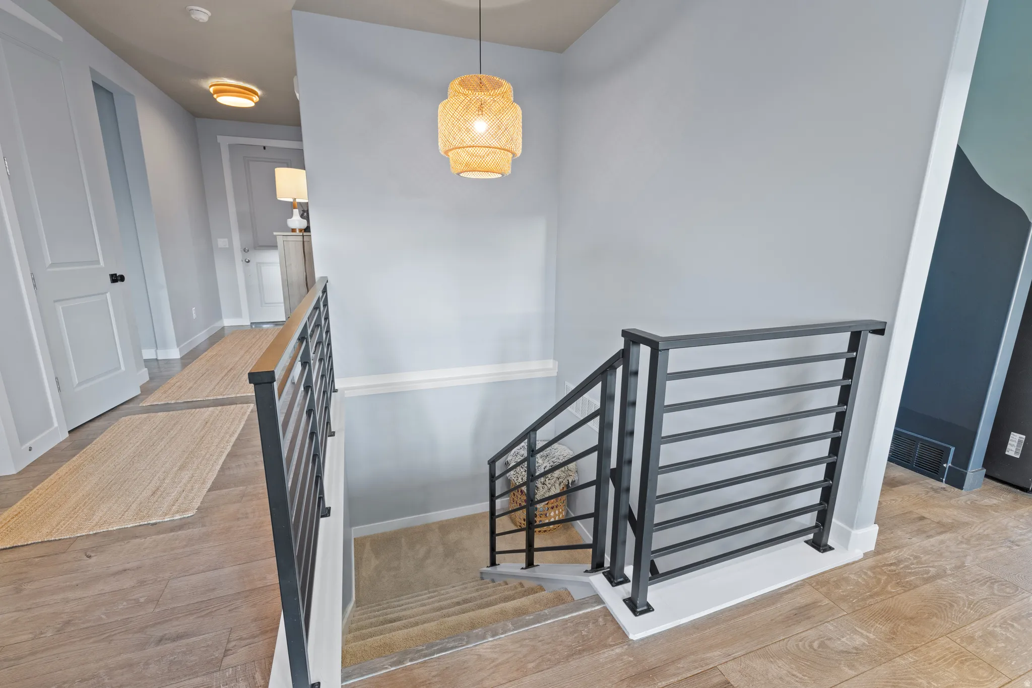 Stairway with wood finished floors