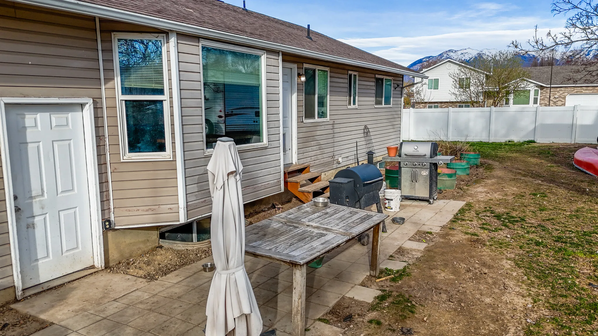 View of patio with area for grilling