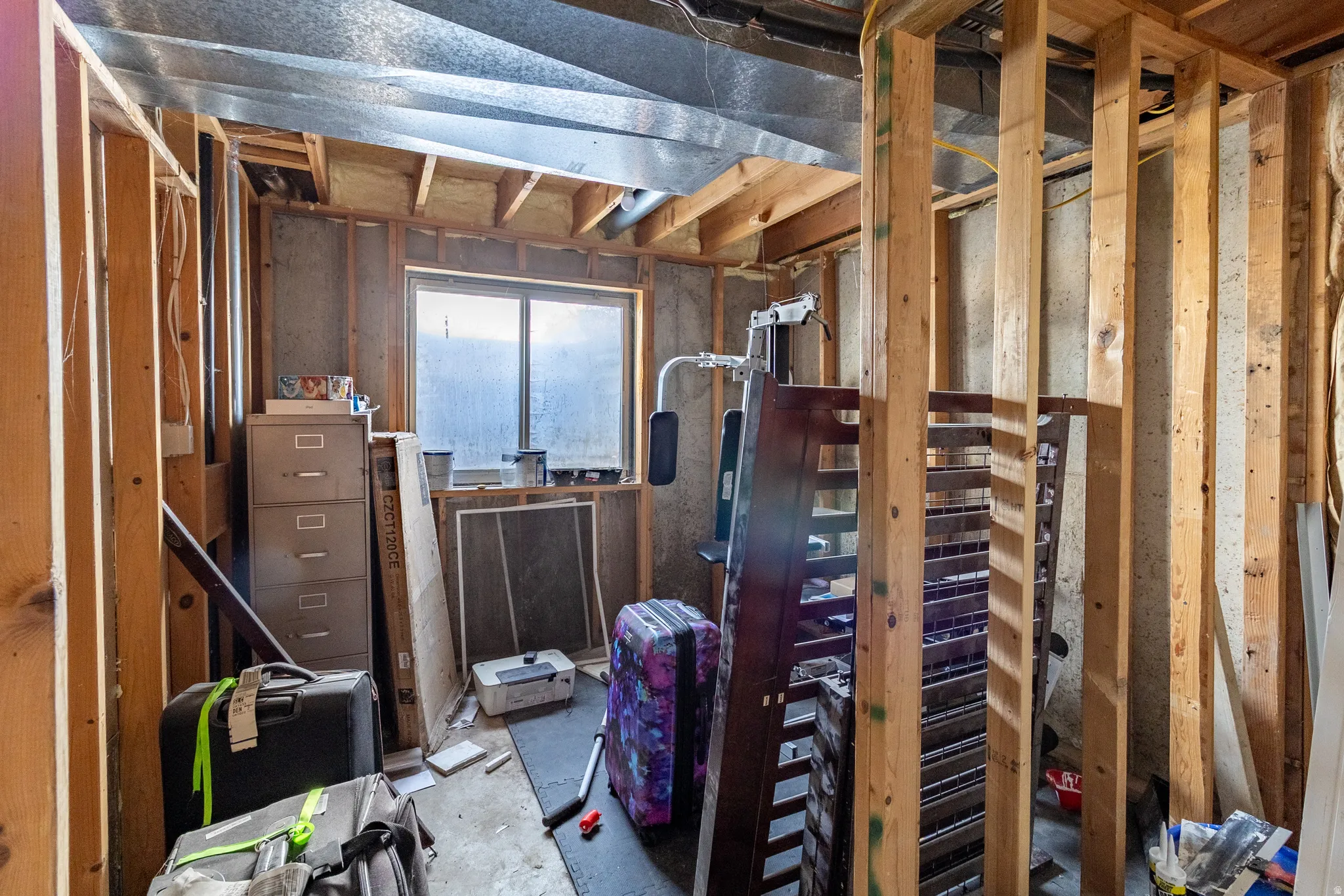 Misc room with concrete floors