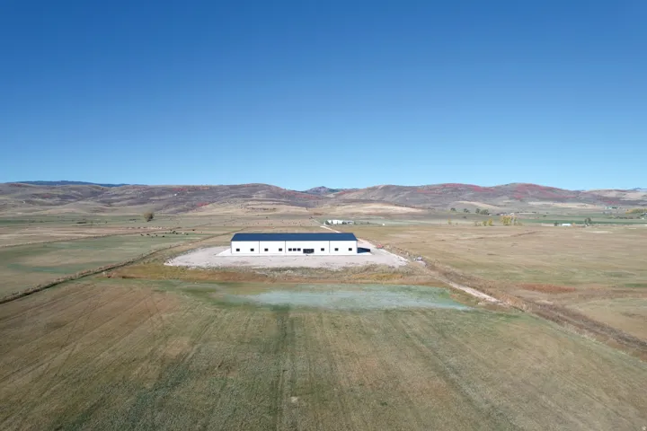 Aerial view of sparsely populated area with mountains