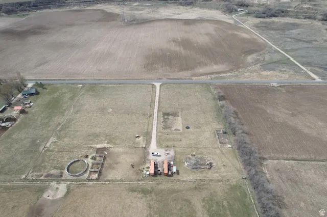 Aerial view of property's location featuring rural landscape and rows of crops