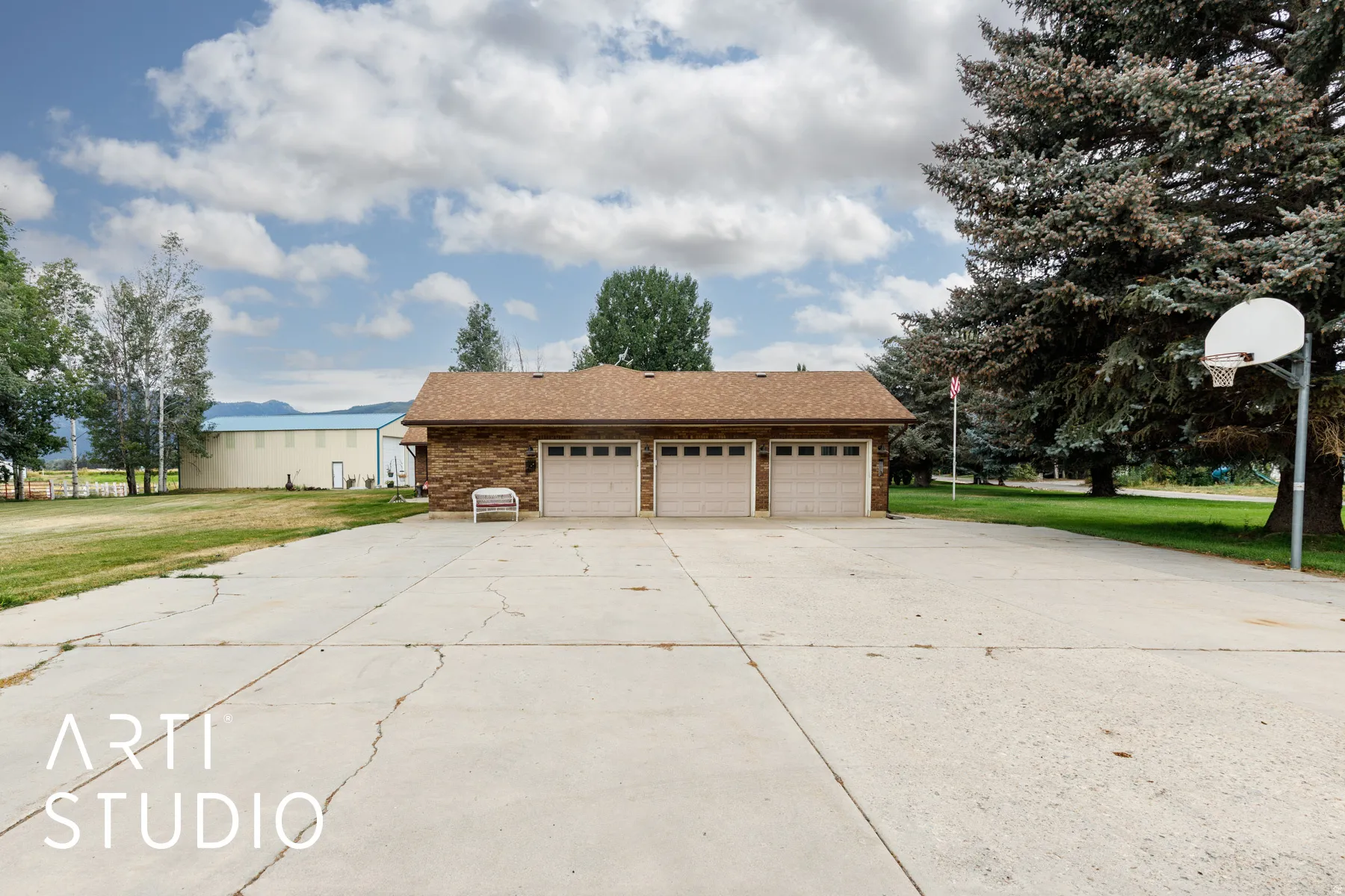 Oversized 3 car garage with driveway