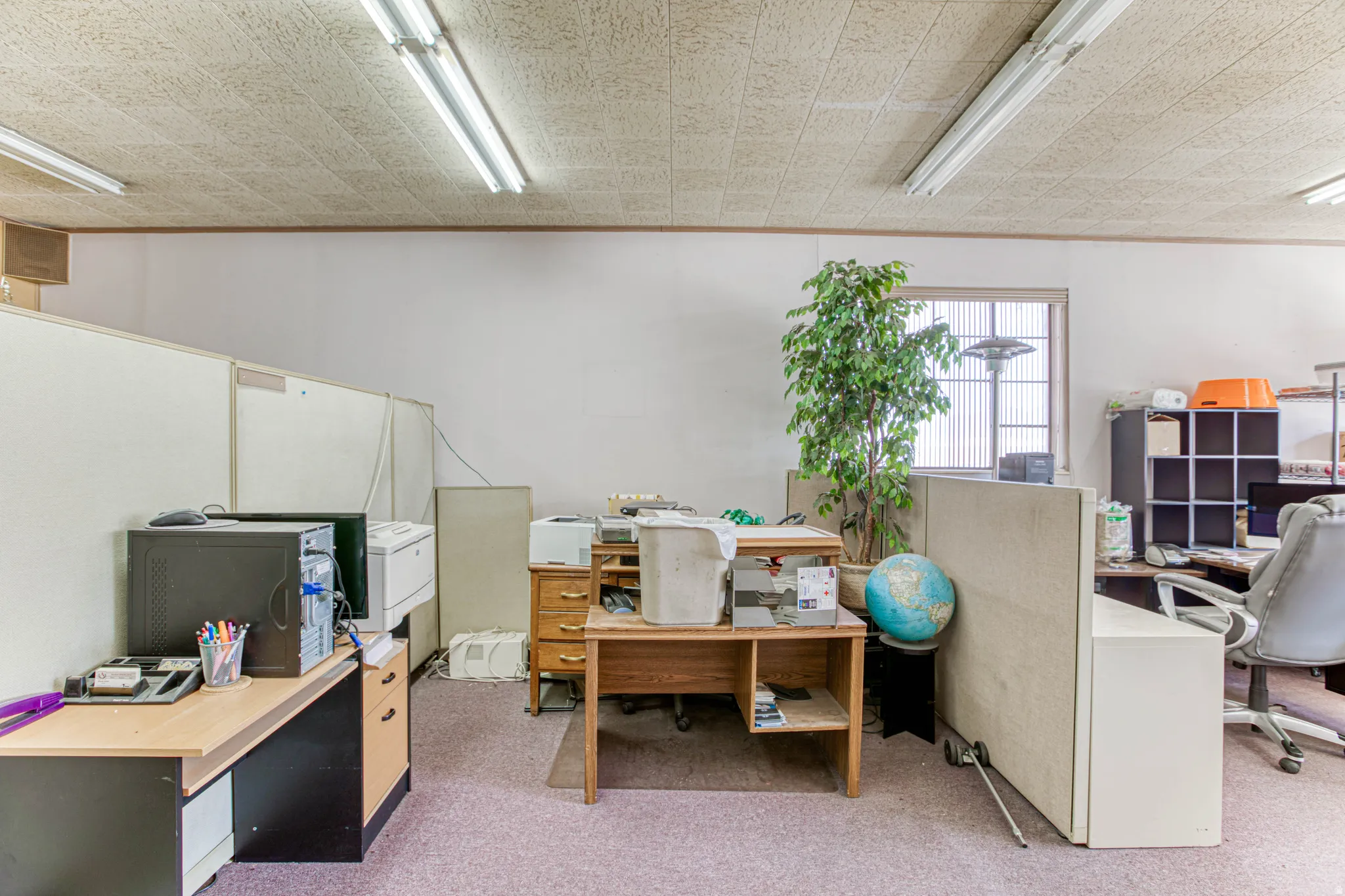 Office area featuring crown molding