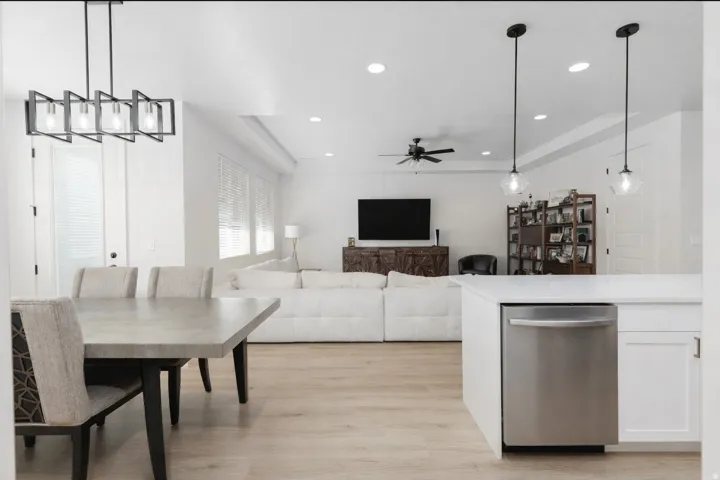 Dining space with recessed lighting, light wood-type flooring, and a ceiling fan
