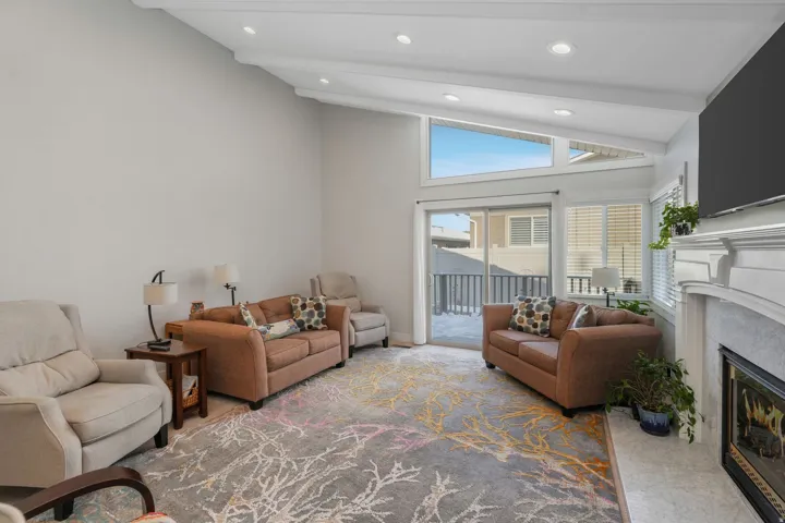 Primary Bedroom featuring light colored carpet and recessed lighting