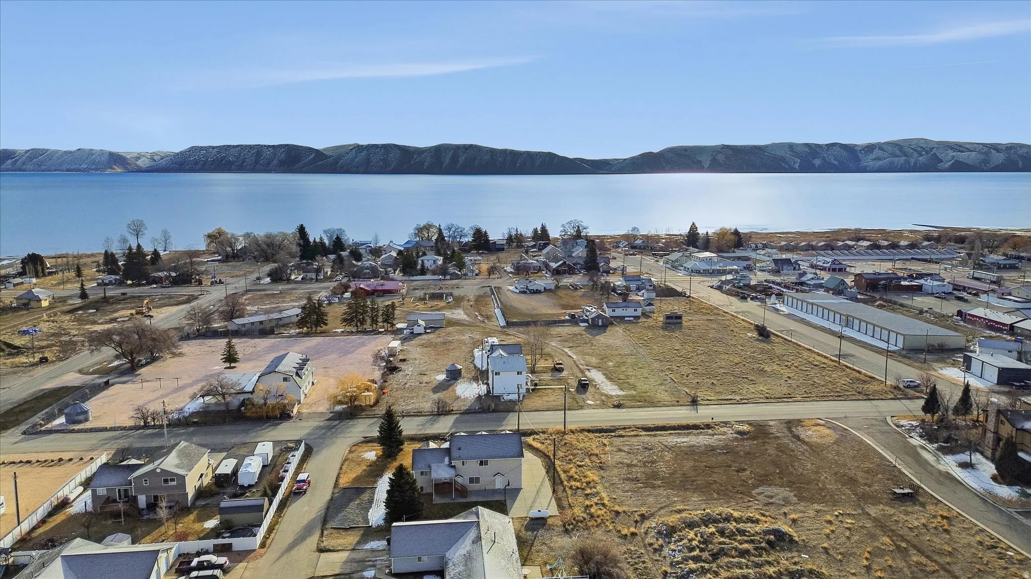 Aerial view of residential area with a water and mountain view