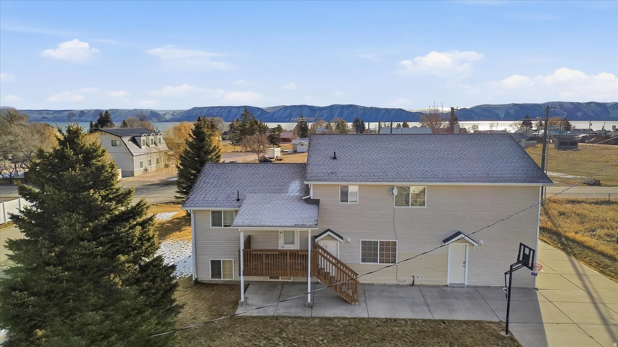 Back of property featuring a mountain view