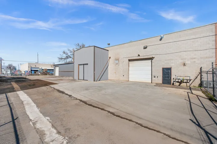 View of outbuilding with a garage