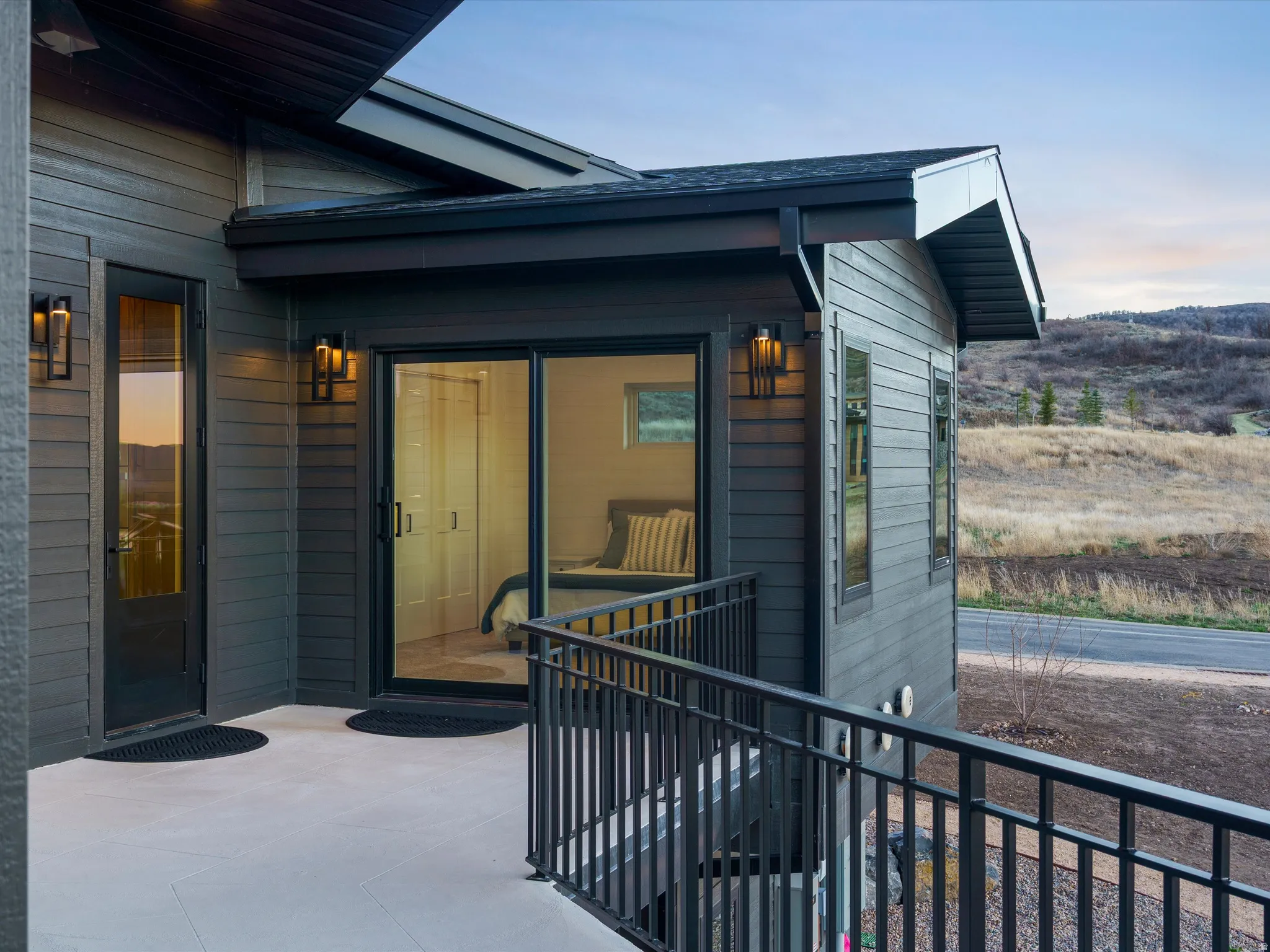 Property entrance featuring a patio