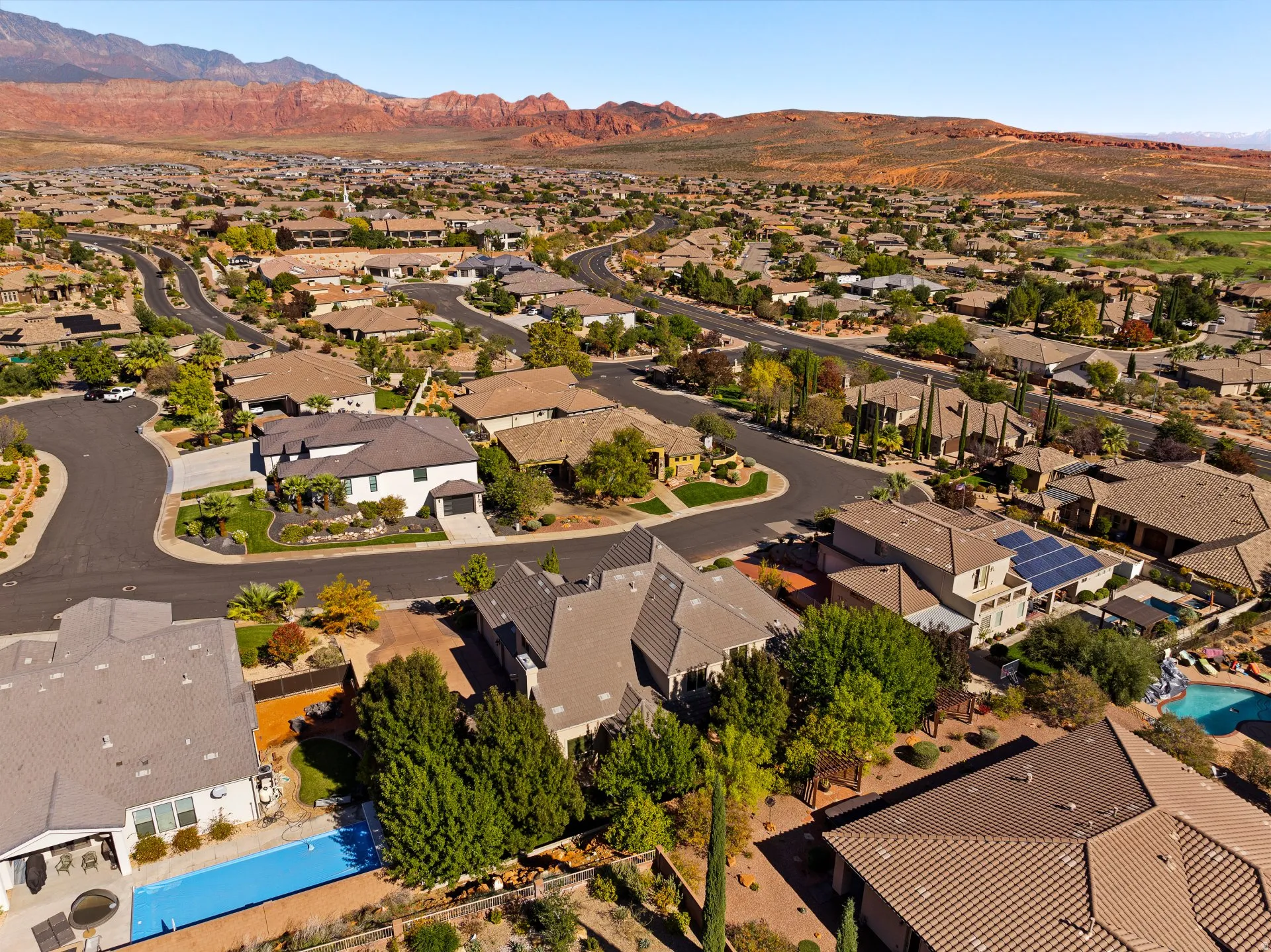 Aerial view of residential area with a mountain backdrop