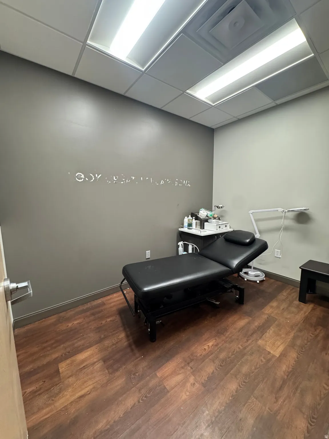 Miscellaneous room with a paneled ceiling