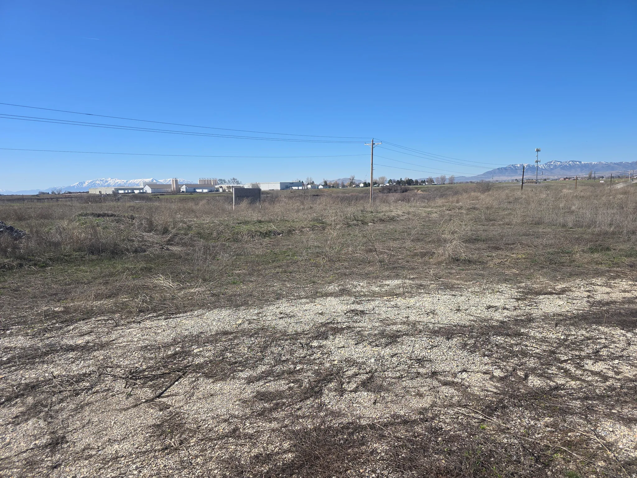 View of yard with a rural view and a mountain view