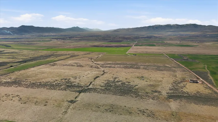 Aerial view of sparsely populated area with mountains