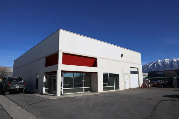 View of commercial property with a mountain view