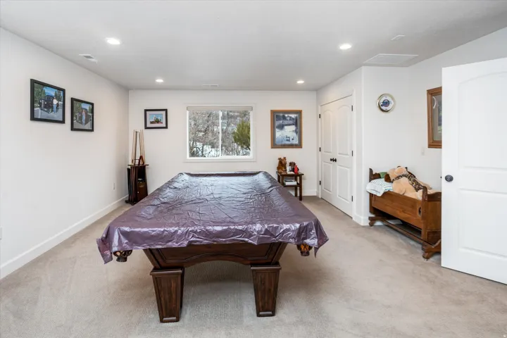 Playroom featuring billiards table, light colored carpet, and recessed lighting
