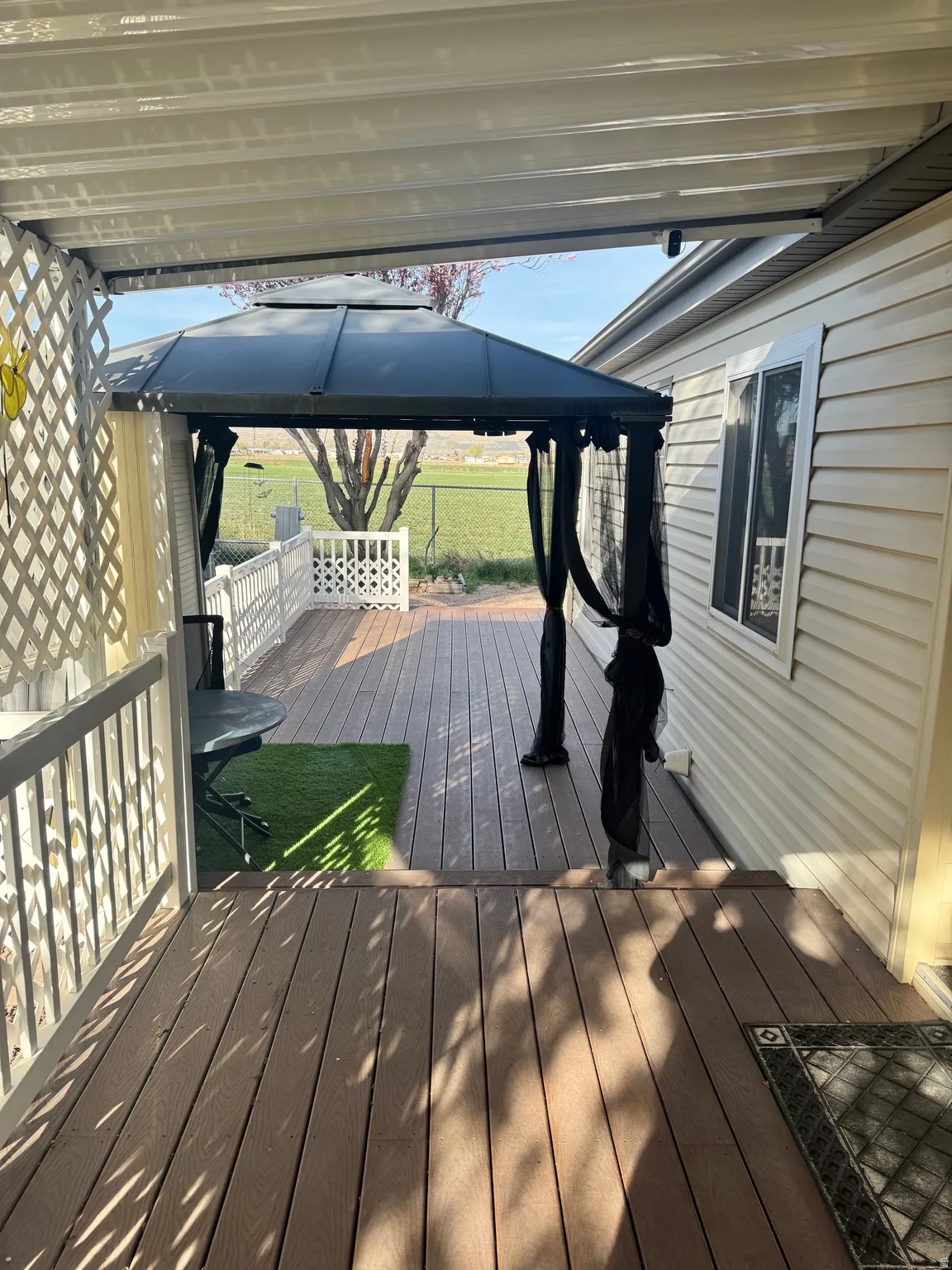 Deck featuring a gazebo