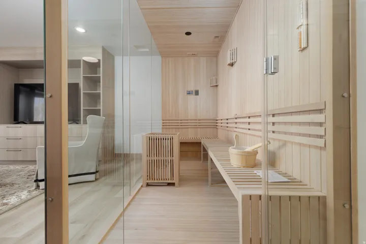 Relaxing sauna / steam room featuring wood-type flooring and wood ceiling