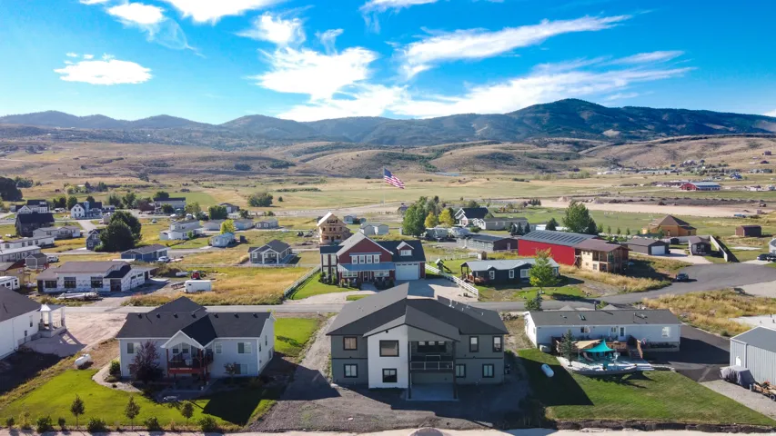Aerial perspective of suburban area with mountains