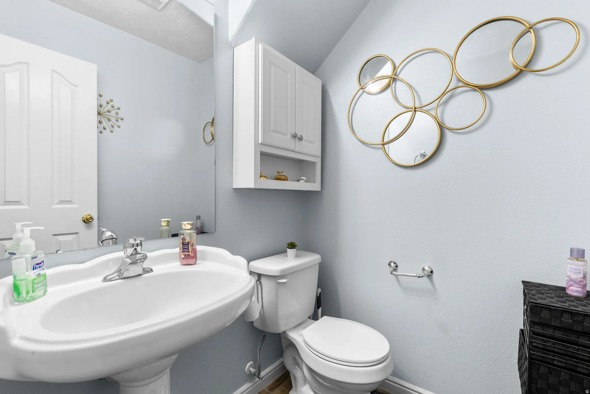 Bathroom featuring toilet and a sink