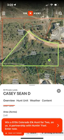 Aerial map of property and surrounding area featuring property parcel outlined