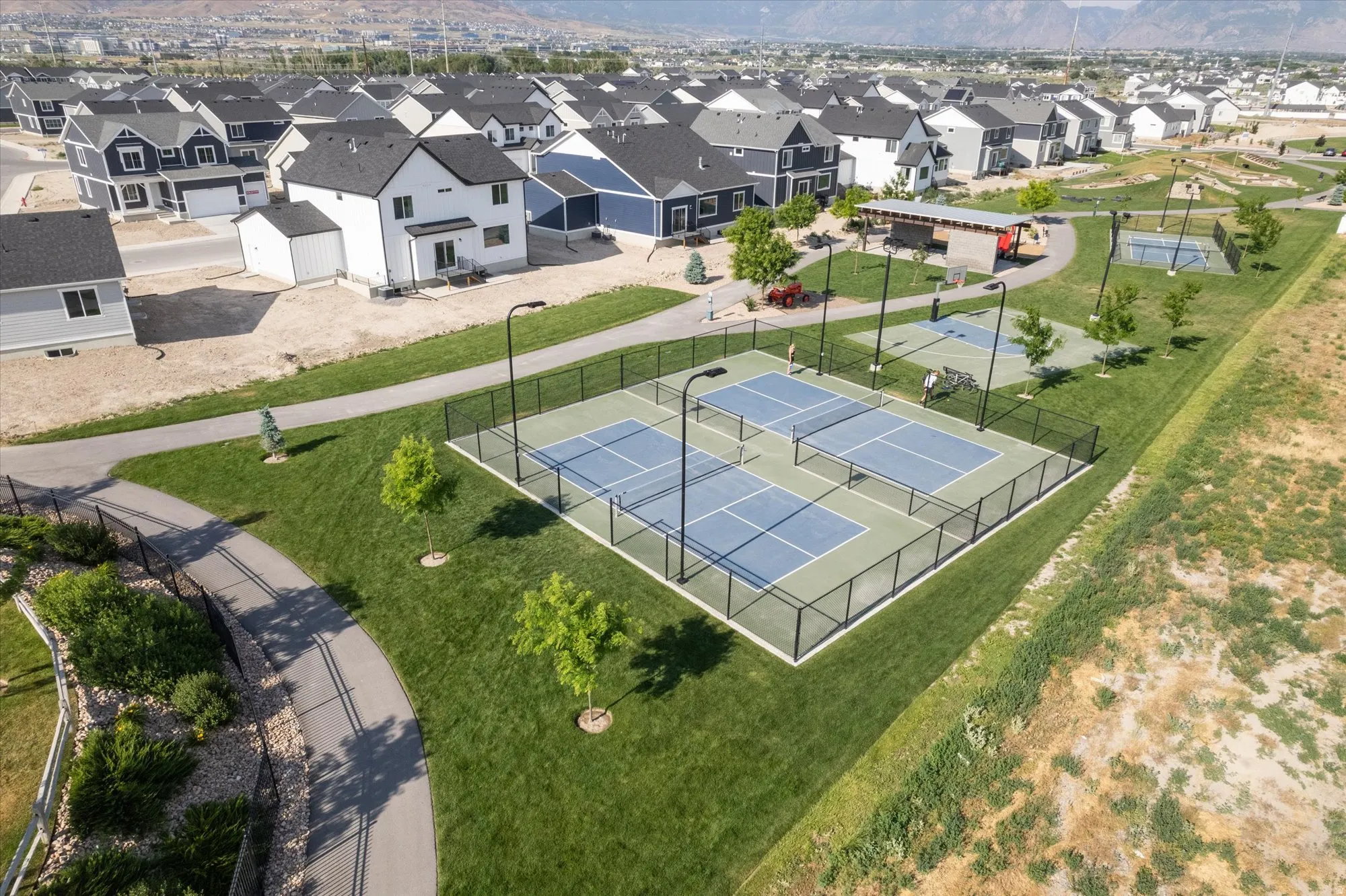 Aerial view of residential area featuring mountains