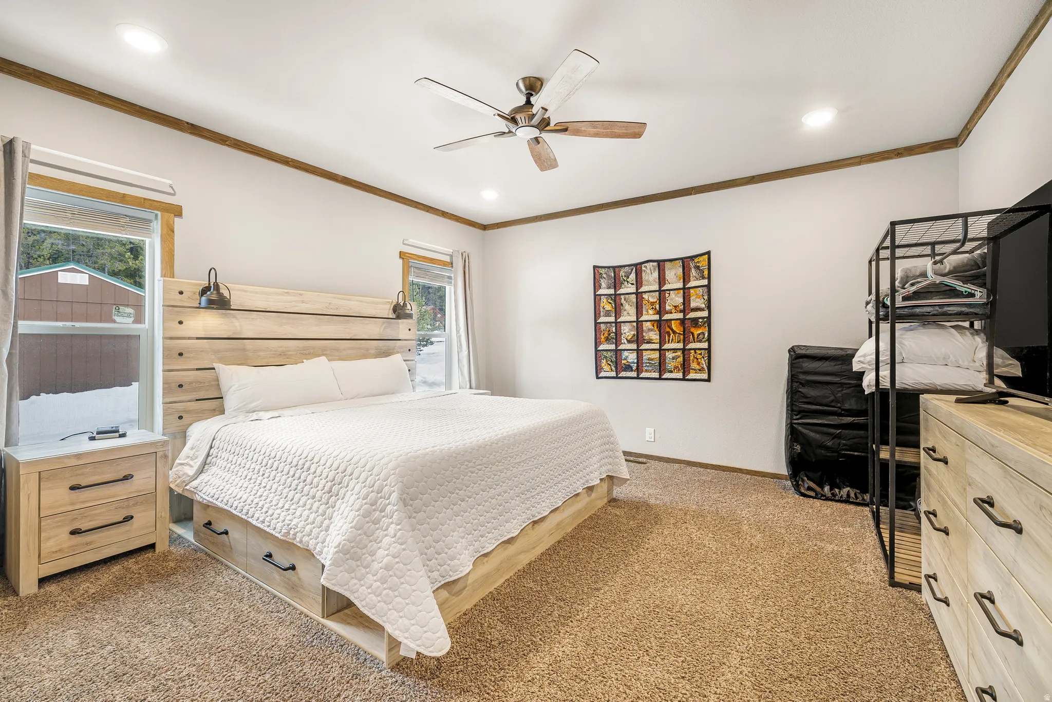 Bedroom featuring light colored carpet, ornamental molding, ceiling fan, and recessed lighting