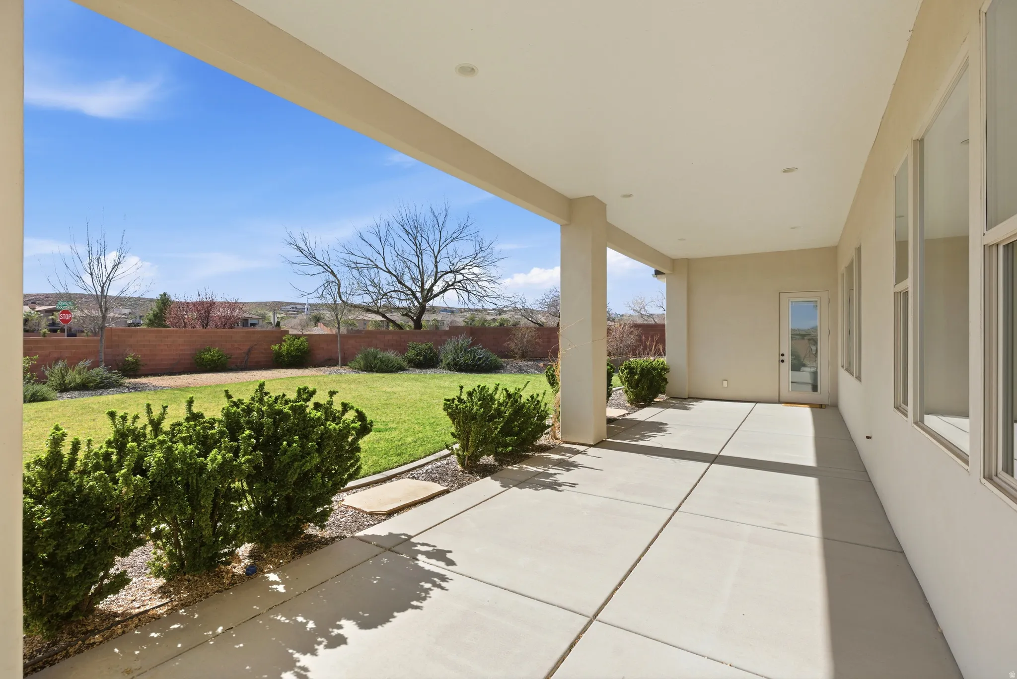 Fenced backyard featuring a patio area