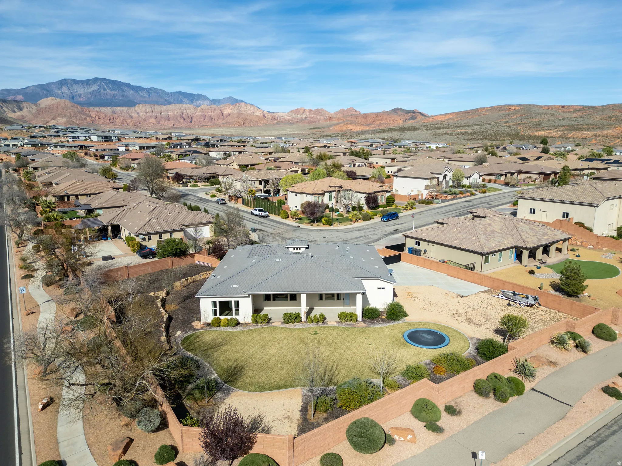 Aerial view of residential area featuring a mountain backdrop