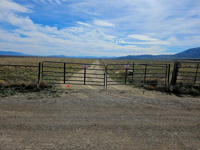 Gate featuring a mountain view