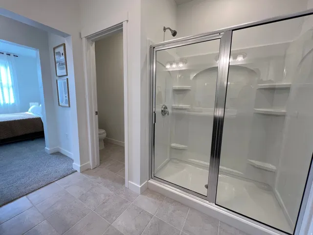 Ensuite bathroom with a shower stall