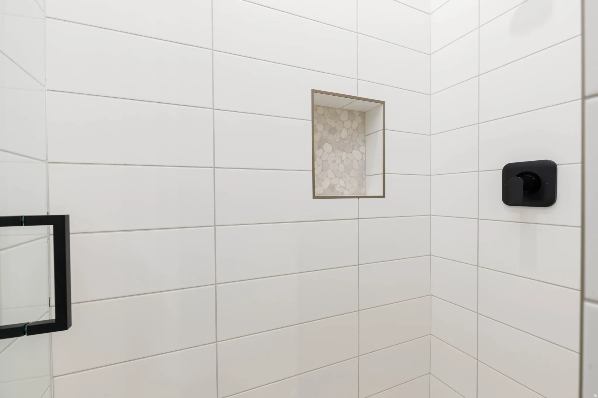 Bathroom view of tiled shower