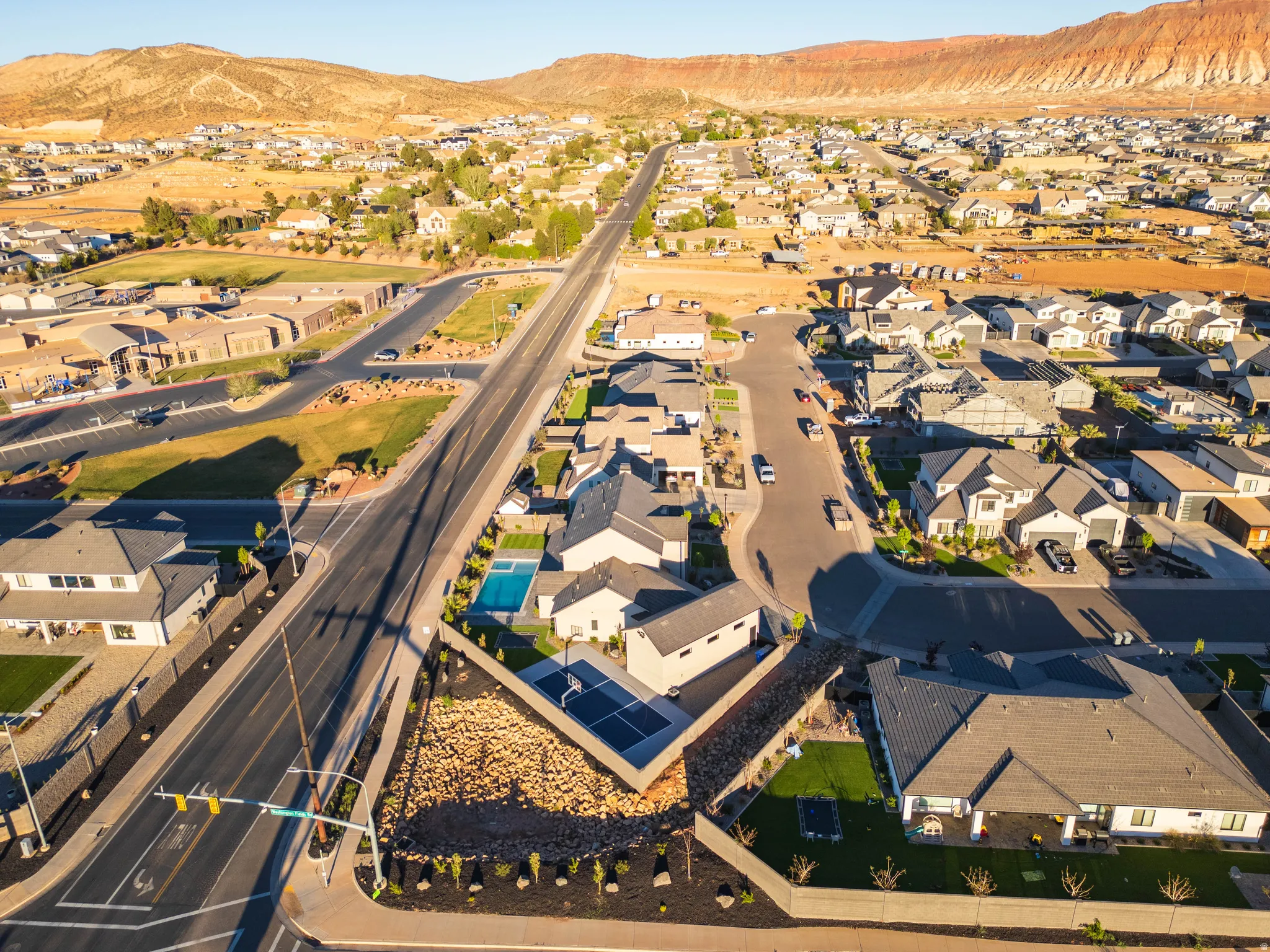 Aerial view of residential area with a mountain backdrop
