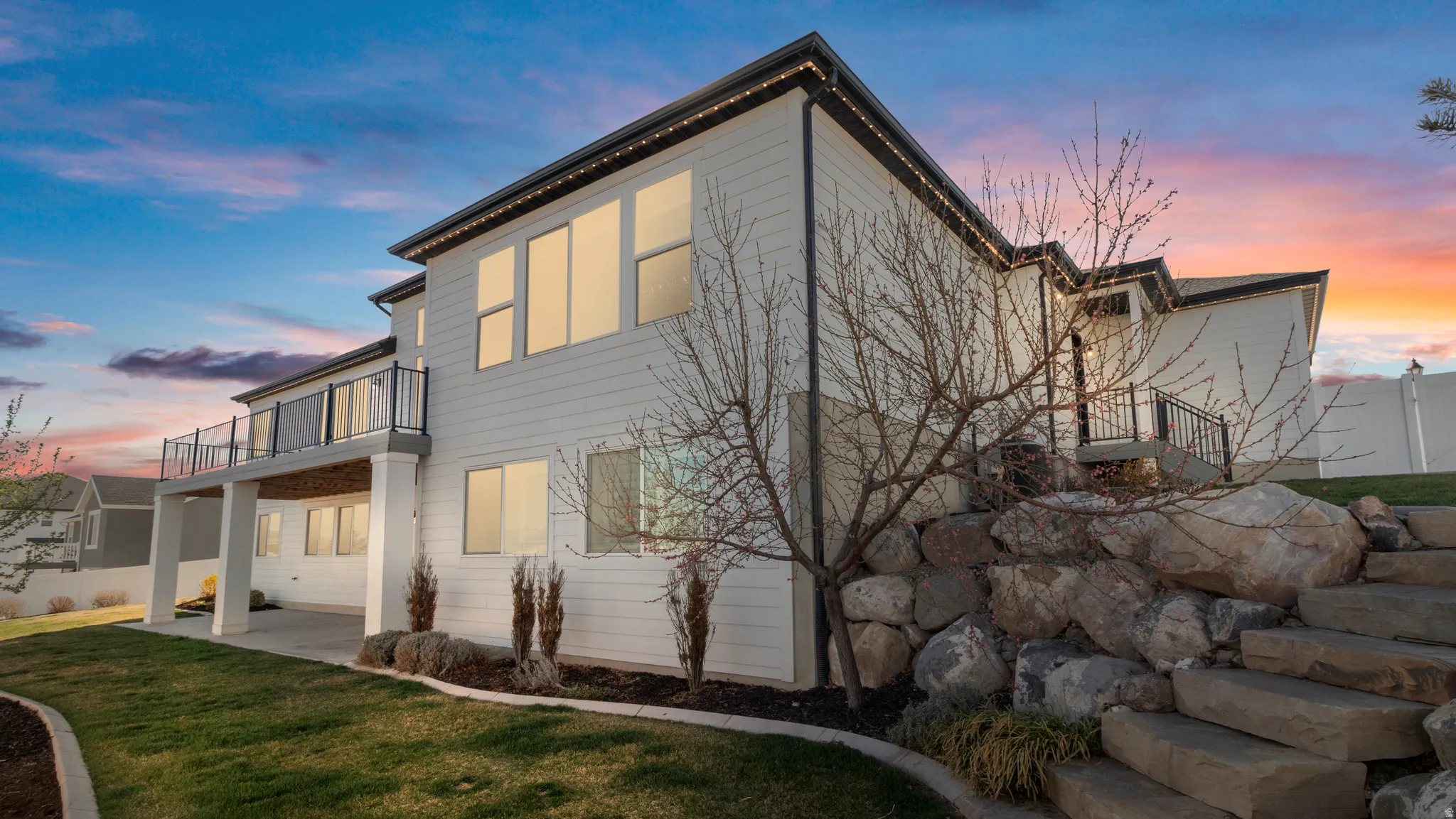 Rear view of house featuring a patio