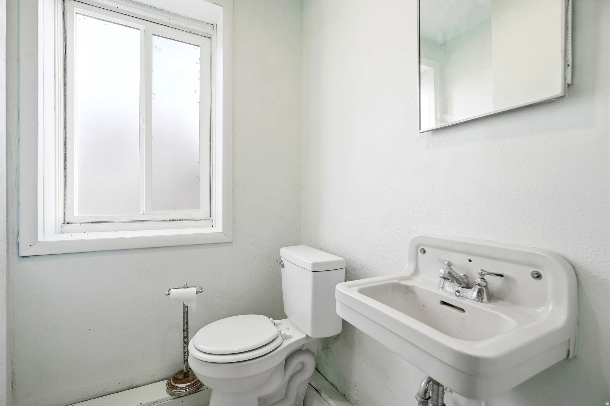 Bathroom with toilet and a sink