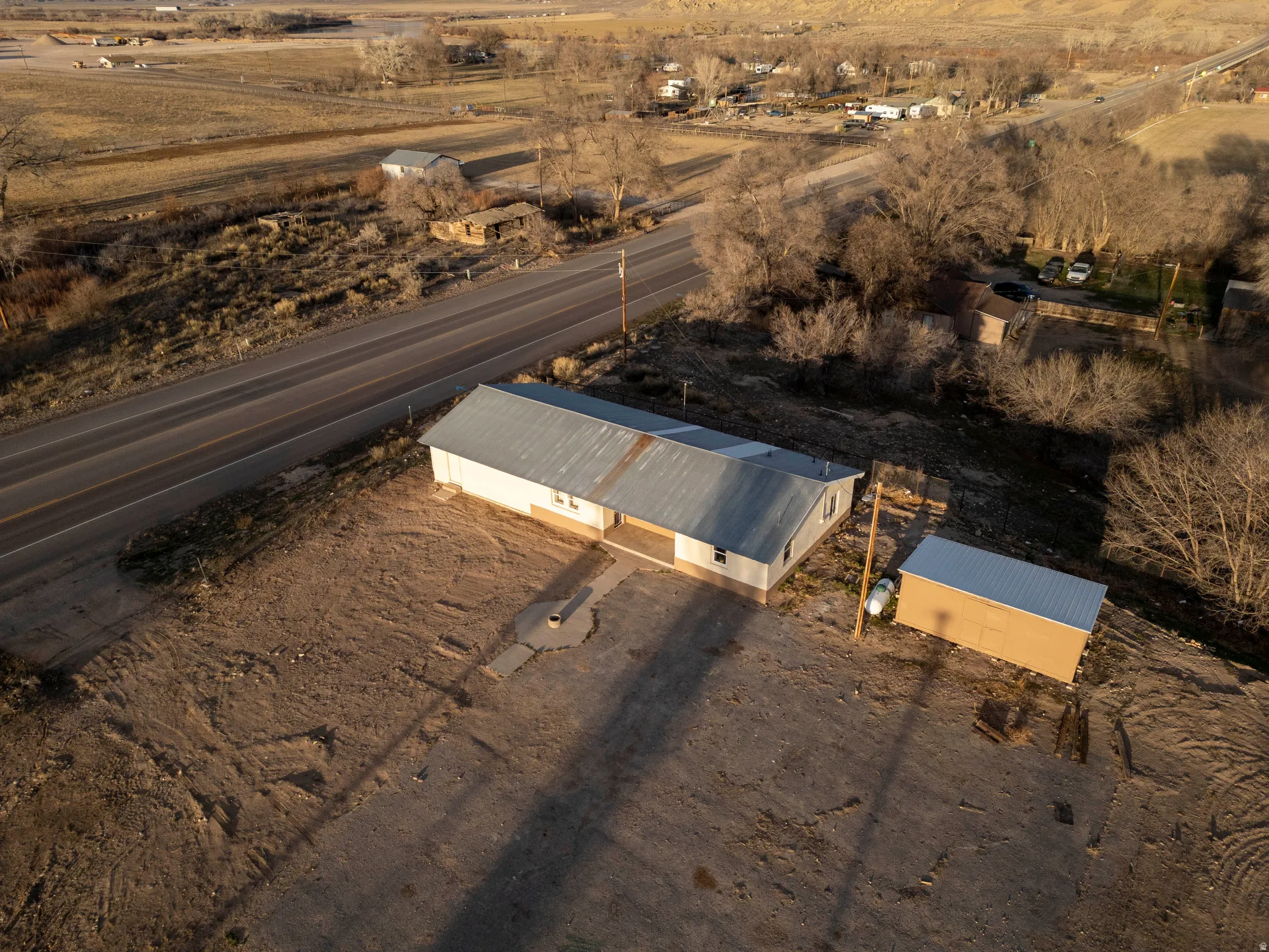 Aerial view of property's location with rural landscape