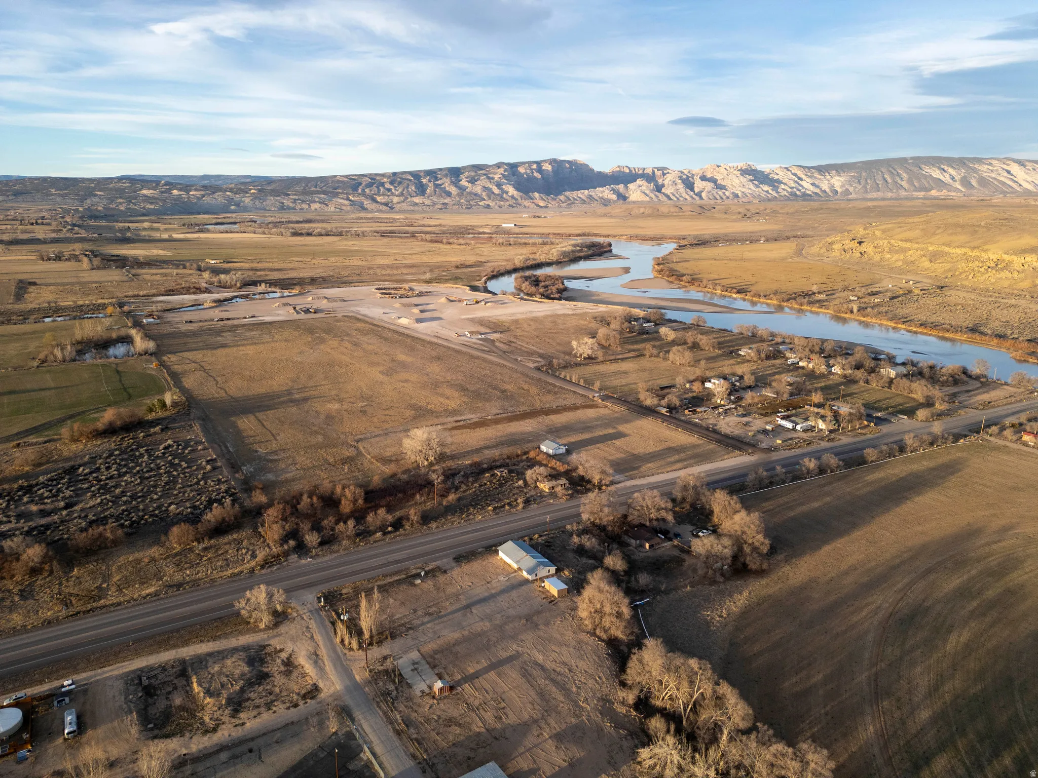 Overview of rural landscape with a water and mountain view