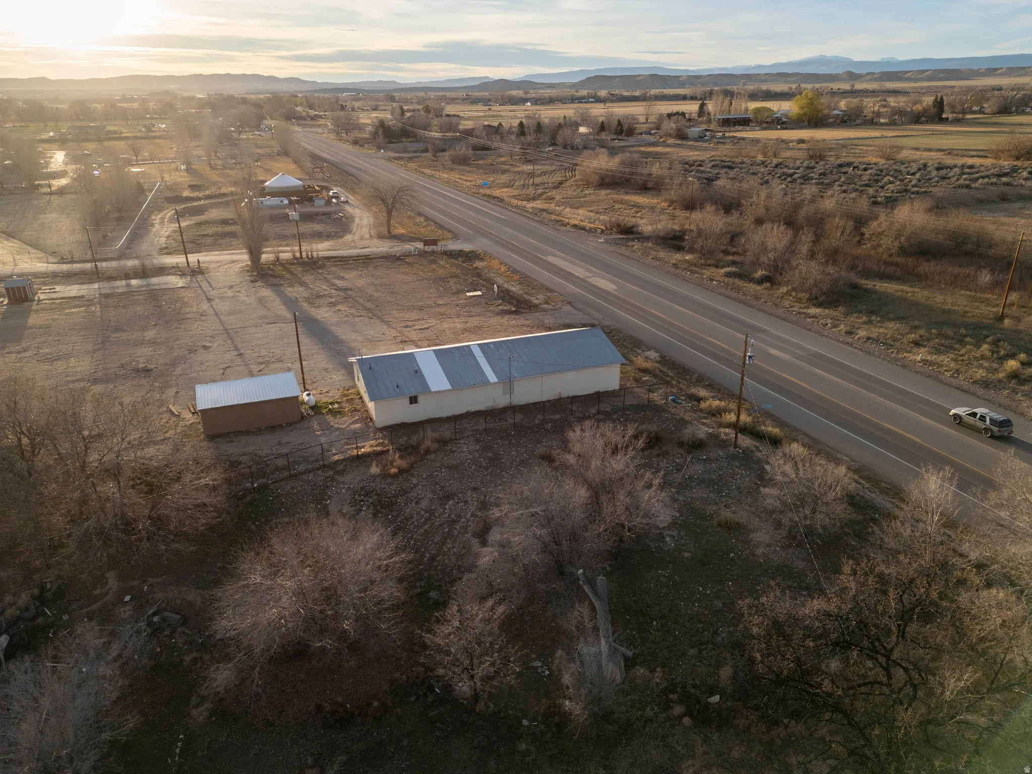 Aerial overview of property's location featuring mountains and rural landscape