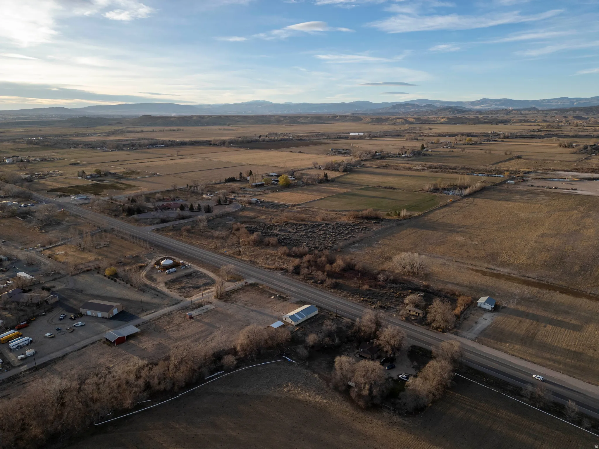 Overview of rural landscape with a mountainous background