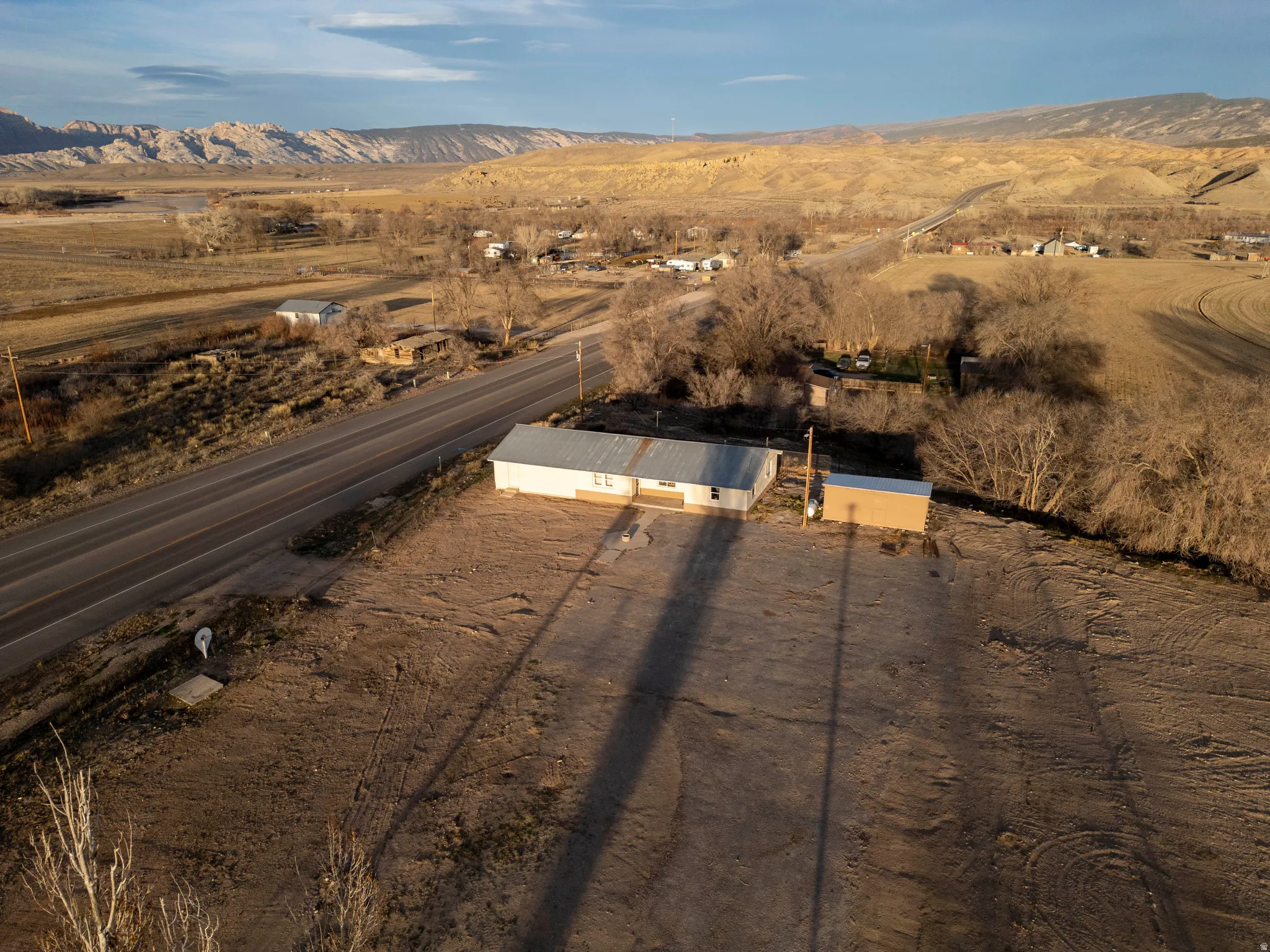 View of mountain background featuring rural landscape