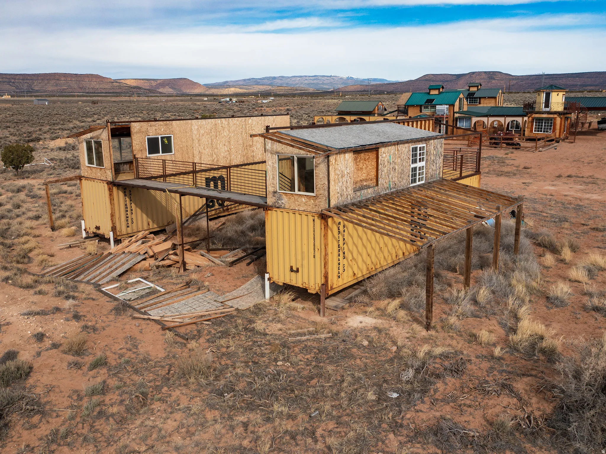 Rear view of property featuring a deck with mountain view