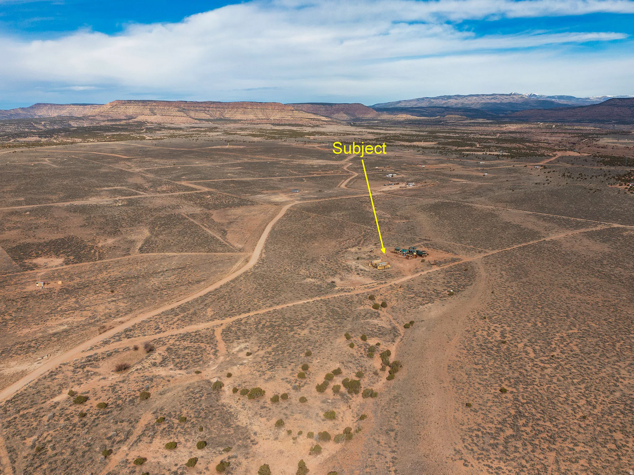 Aerial view of sparsely populated area featuring mountains
