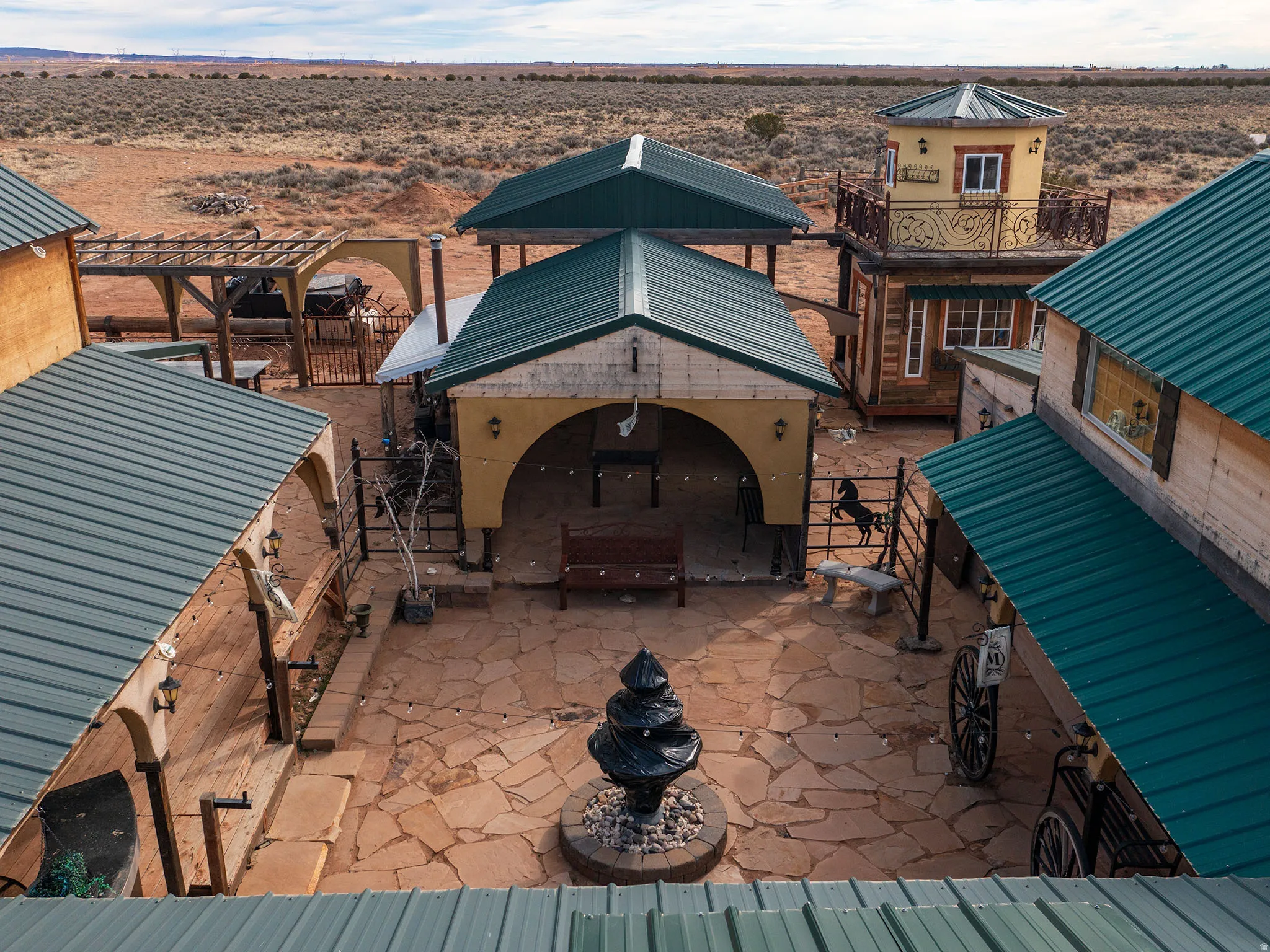 View of patio with a pergola and a desert view